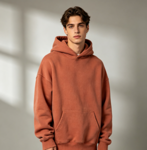 Men's oversized heavyweight hoodie in clay earth-tone, garment-dyed, custom OEM manufacturer from 100 pcs
