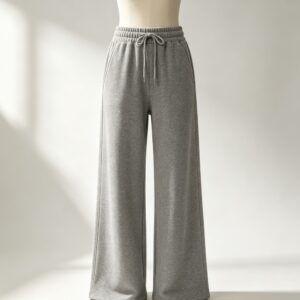 Grey wide-leg french terry sweatpants with drawcord waistband on an invisible form