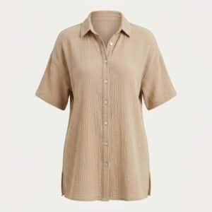 Custom beach cover-up shirt in sand cotton gauze — longline button-through, private label resortwear manufacturing