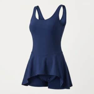 Custom swim dress in navy with attached flared skirt and built-in bottom — OEM swimwear factory