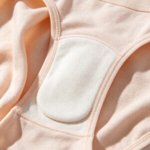 Cotton gusset coverstitched into the brief body with flat covered elastic leg opening